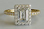 Emerald Cut Solitaire Engagement Ring Yellow Gold Halo Style
