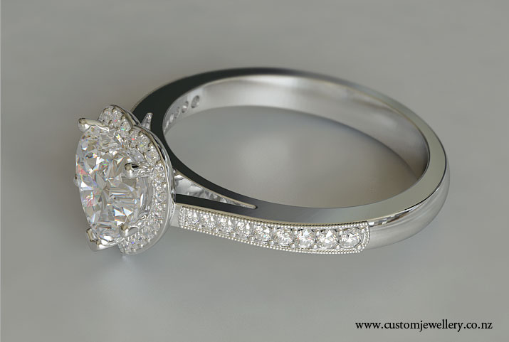 Heart Shaped Diamond Engagement Ring with Halo of Round Diamonds