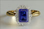 emerald cut  sapphire engagement ring, vintage style jewellery, art deco, yellow gold