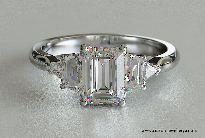 Emerald cut engagement rings with side stones