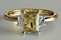 Radiant Fancy Yellow Diamond Three Stone Engagement Ring