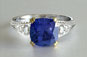 Cushion Cut Blue Sapphire And Round Diamond Split Shank Engagement Ring