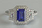 three-stone engagement ring, emerald cut sapphire, trapezoid diamonds, platinum