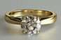 Brilliant Cut Diamond Solitaire Crossover Yellow 18kt Gold
