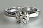 Brilliant Cut Diamond Solitaire Crossover Setting
