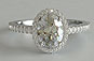 Oval Diamond Solitaire Engagement Ring Microset Halo