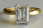 Emerald Cut Diamond Solitaire Engagement Ring in Yellow Gold