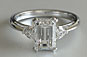 Three-stone Emerald and Heart Cut Diamond Engagement Ring
