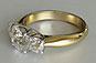 Three Stone Brilliant Lucida Style Crossover Yellow Gold Ring