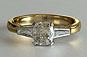 Yellow Gold Cushion and Tapered Baguette Diamonds Three-stone Engagement  Ring