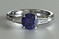 Vintage Style Round Saspphire and Baguette Side Stones Engagement Ring