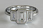 Emerald Cut Three Stone Bezel Set Engagement Ring