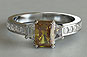 Fancy Yellow Radiant Cut Diamond and Trapezoid Three-stone Engagement Ring