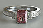 Pink Radiant Cut Saqpphire and Trapezoid Three-stone Engagement Ring