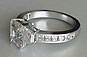Radiant Cut Diamond and Trapezoid Three-stone Engagement Ring