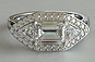 Emerald Cut Diamond with Trillion Sides Halo Three Stone Engagement Ring