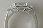 Emerald Cut Diamond with Trillion Sides Halo Three Stone Engagement Ring